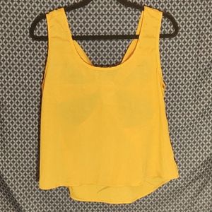 XTaren - Mustard yellow polyester tank top with bow shape cutout back. Size- L